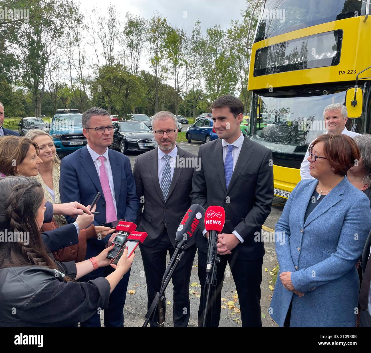 (left to right) Minister of State Patrick O'Donovan, Minister for Children and Equality Roderic O'Gorman, and Minister of State Jack Chambers at the launch of the new 99 bus route to the Phoenix Park visitor centre. Picture date: Thursday October 5, 2023. Stock Photo