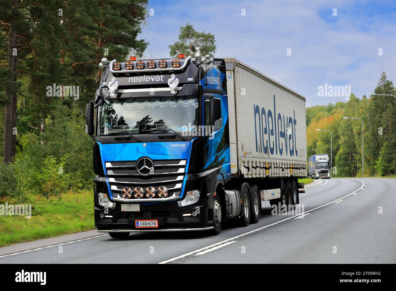 Mercedes-Benz Actros 2853 truck semi trailer Neele-Vat logistics transports goods in highway truck traffic. Road 25, Raasepori, Finland. Sept 8, 2023. Stock Photo