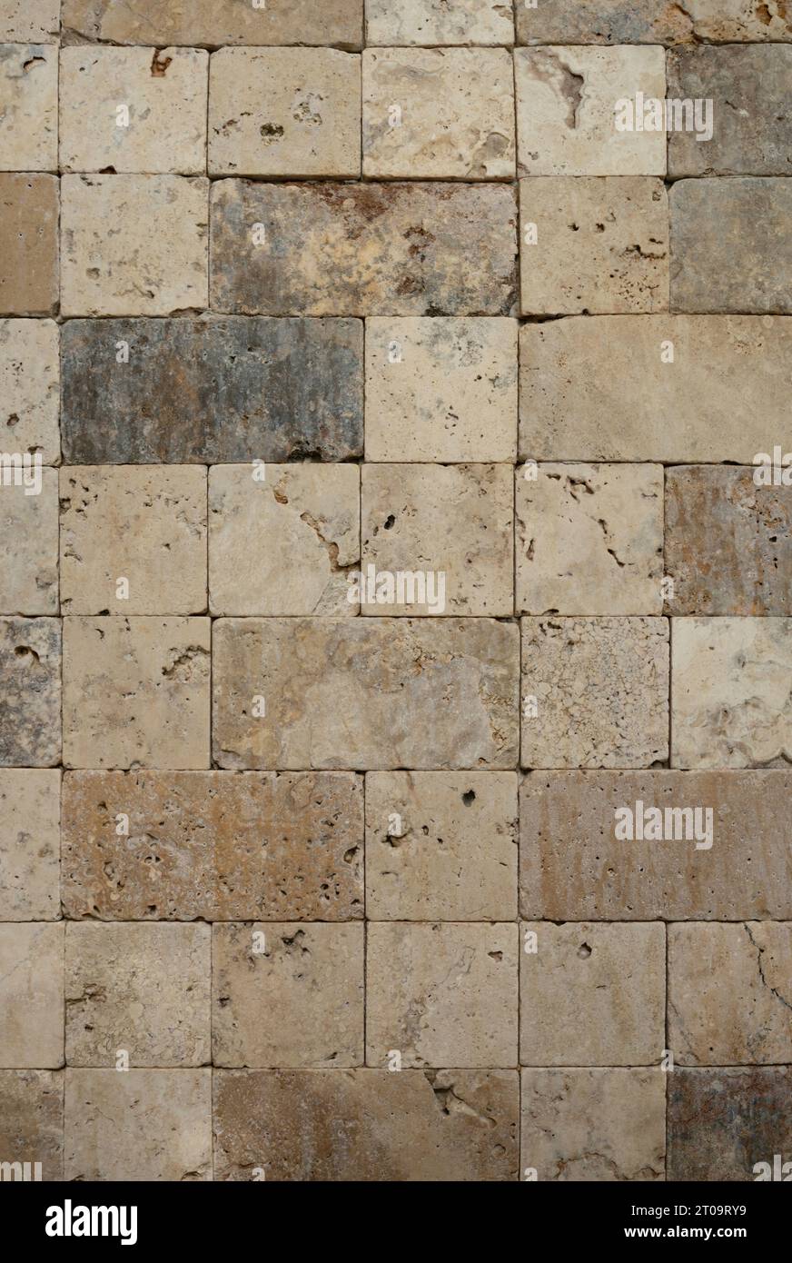 Mosaic brown square stone pattern wall background close up view Stock Photo