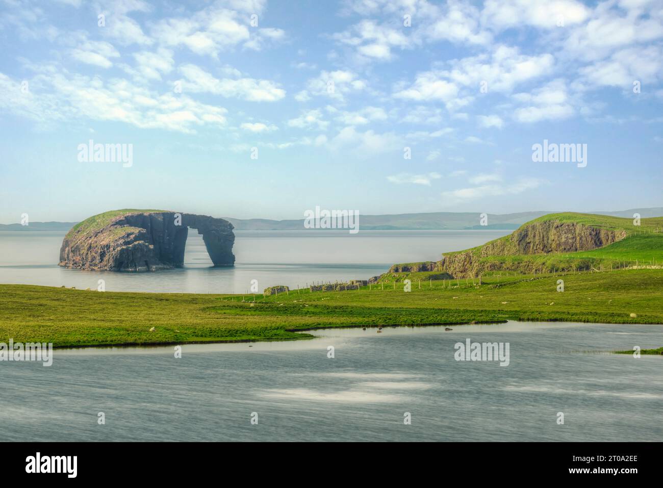 Sea Arch Dore Holm at Stennes, Eshaness, Shetland Islands Stock Photo