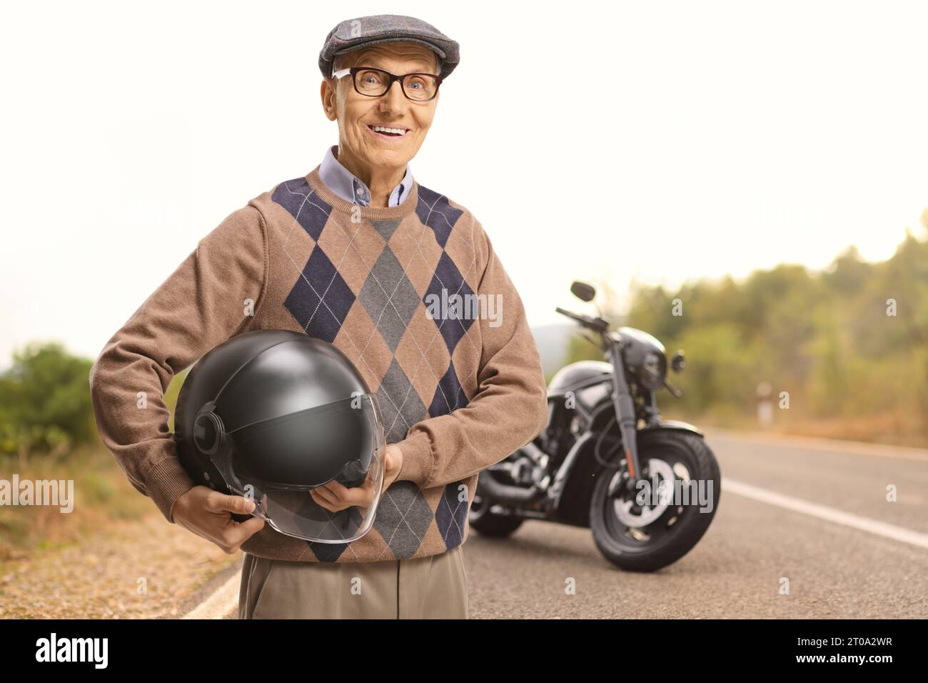 Man holding motorcycle helmet hi-res stock photography and images - Alamy
