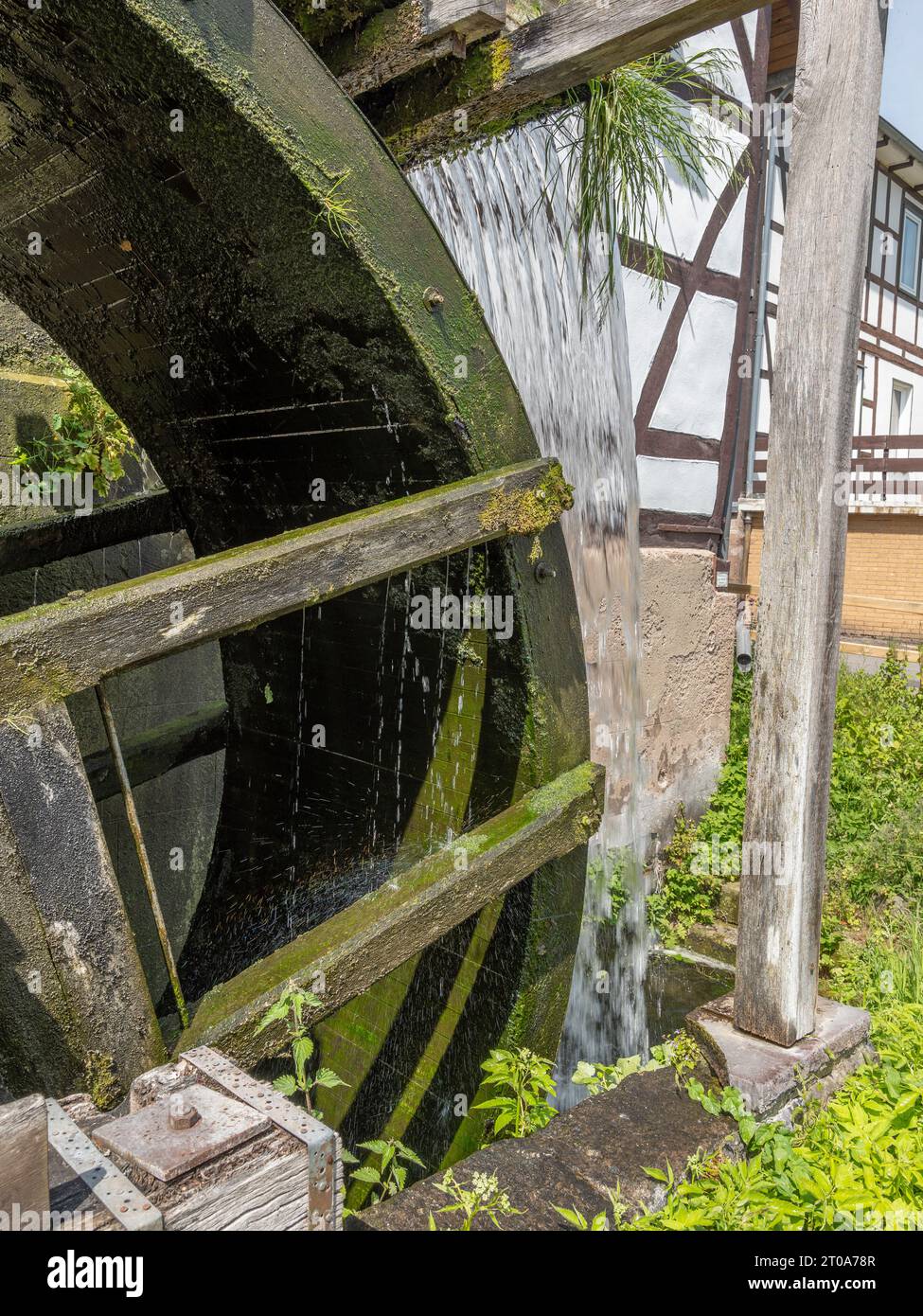 Close-up of a water-driven mill wheel of a watermill. Wilhelm Busch Mill Ebergötzen, Germany Stock Photo