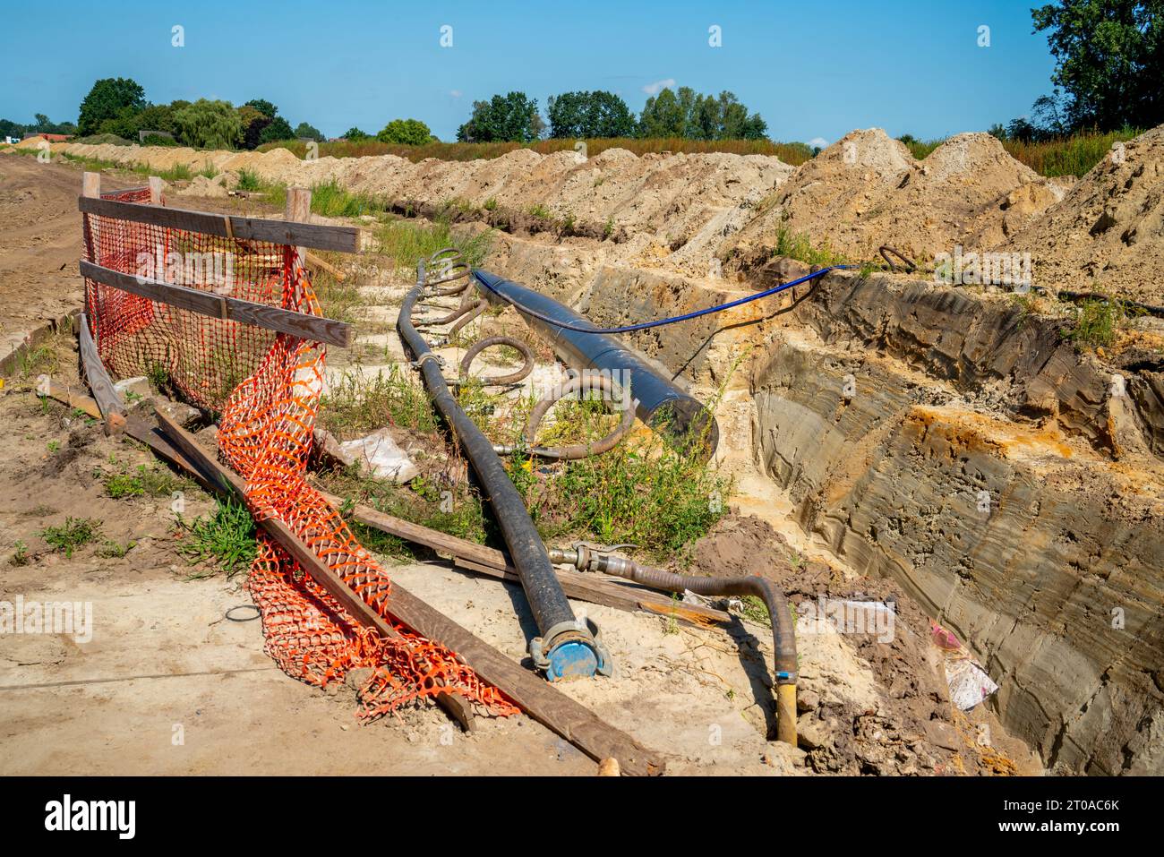 Ground works to place a water pipe Stock Photo Alamy
