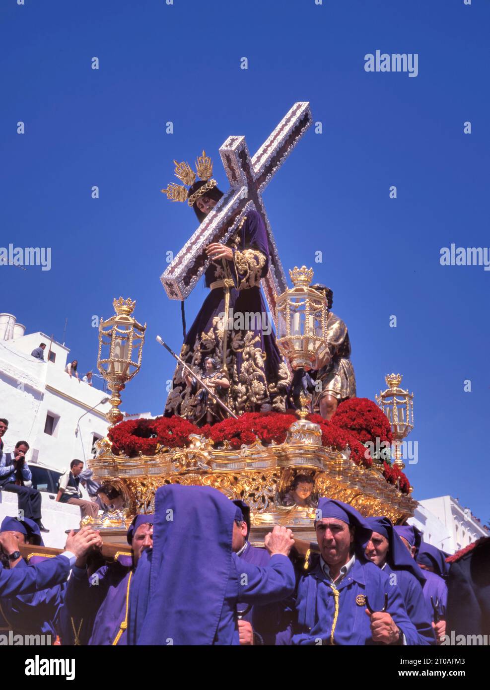 ARCOS DE LA FRONTERA, SPAIN – APRIL 07, 2023 Catholic processions in the streets of the village  during the Semana Santa. The annual tribute of the Pa Stock Photo