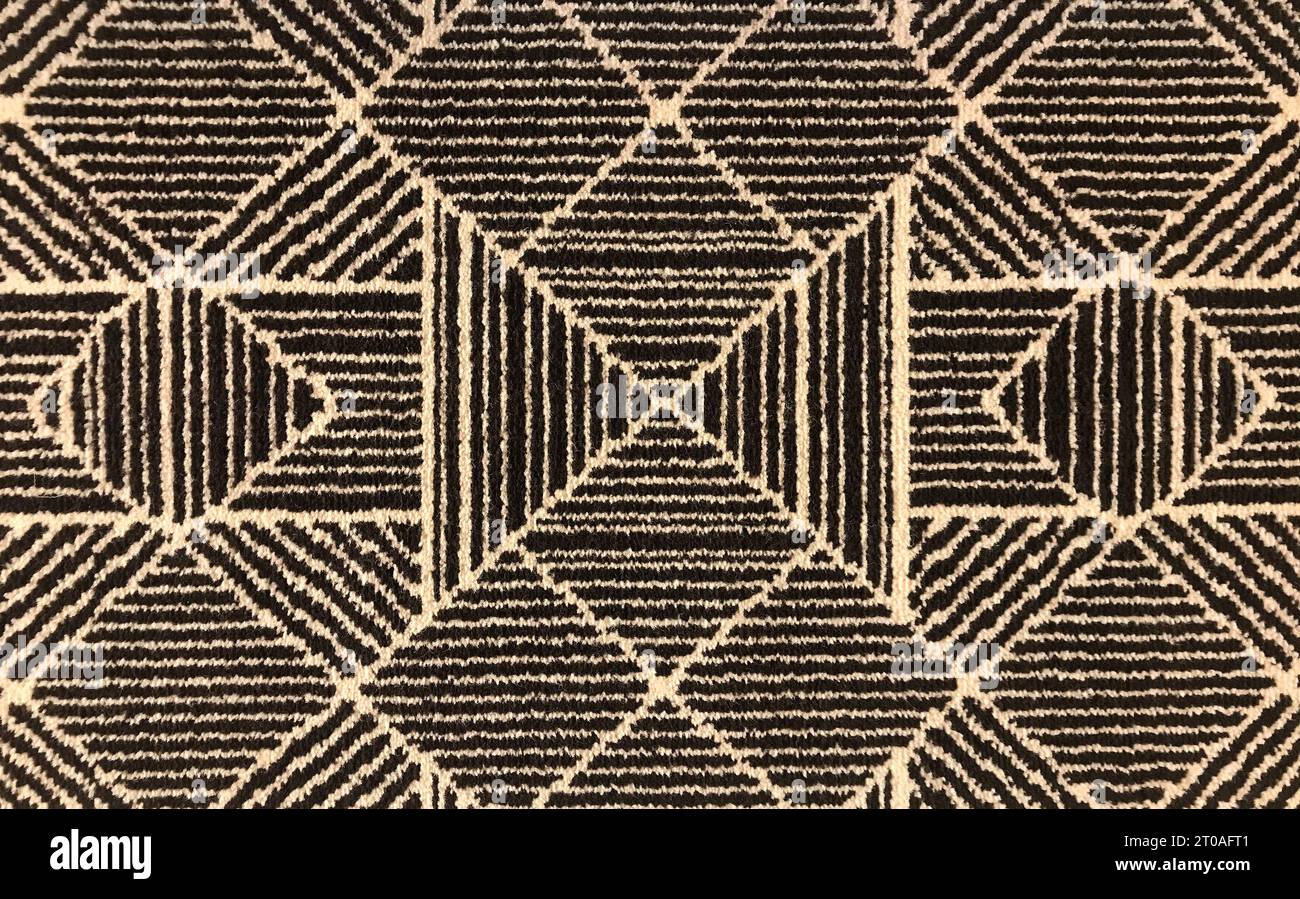 Pattern of yellow gold and black diamond geometric pattern in art deco style, similar to allred collaborative Rainier RAI-03 ivory rug pattern. Stock Photo