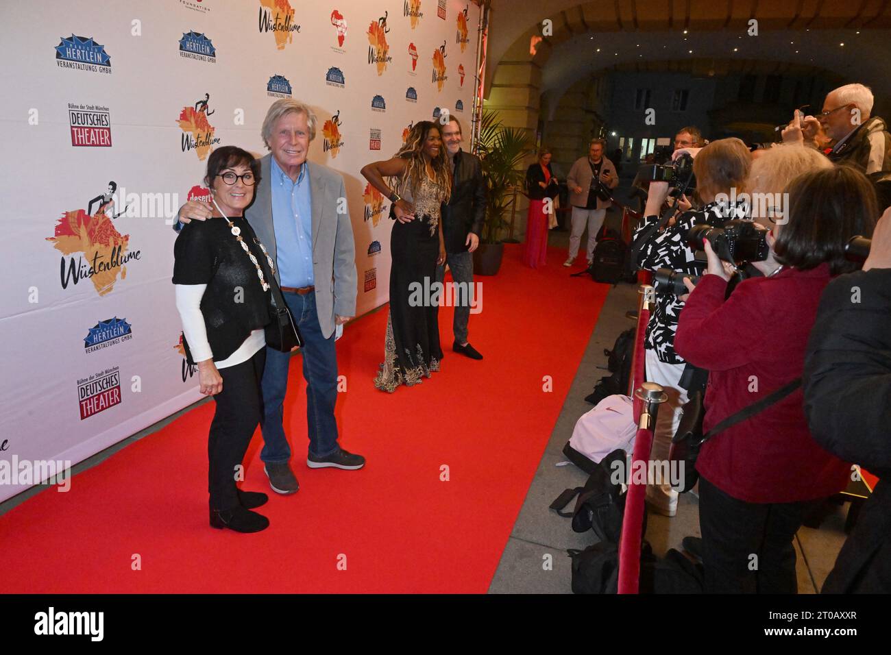 Munich, Germany. 05th Oct, 2023. Actor Sigmar Solbach and his wife Claudia Solbach stand on the red carpet at the German premiere of the musical 'Desert Flower' at the Deutsches Theater. The musical of the same name is based on a novel by Waris Dirie, Credit: Felix Hörhager/dpa/Alamy Live News Stock Photo