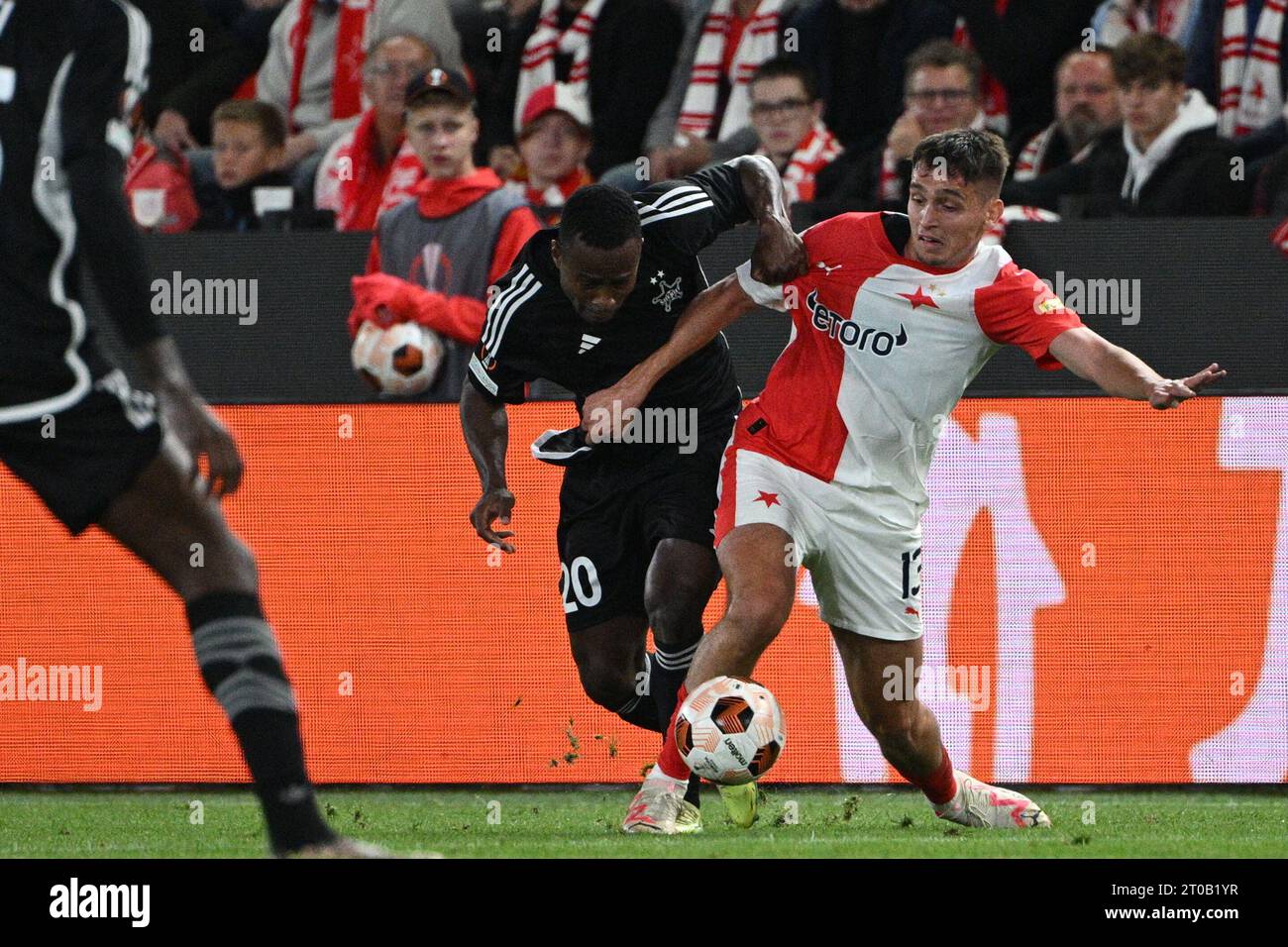 Prague, Czech Republic. 05th Oct, 2023. Soccer players L-R Armel Zohouri of  Tiraspol and Andres Dumitrescu of Slavia Praha in action during the  Football Europe League 2nd round match, group G match