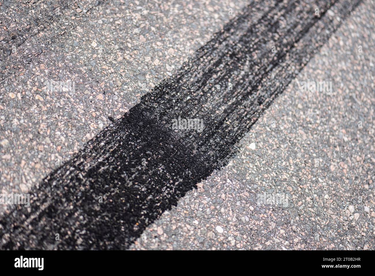 Burnout tire marks on asphalt Stock Photo - Alamy