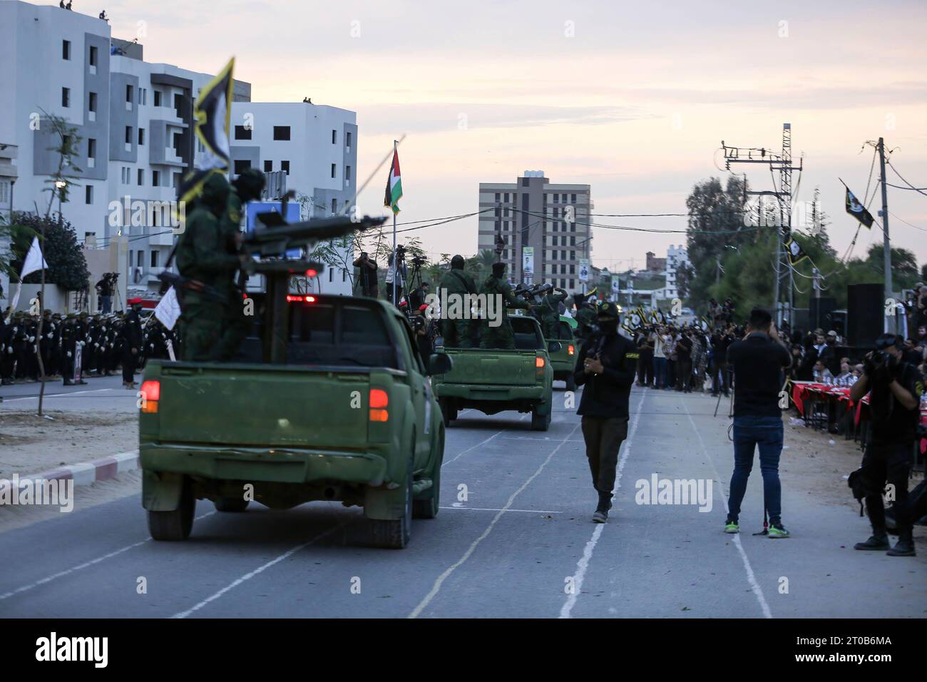 Members of the Al-Quds Brigades, the military wing of the Islamic Jihad movement, participate in an anti-Israel military parade on the occasion of the 36th anniversary of the founding of the movement in Gaza City. Stock Photo