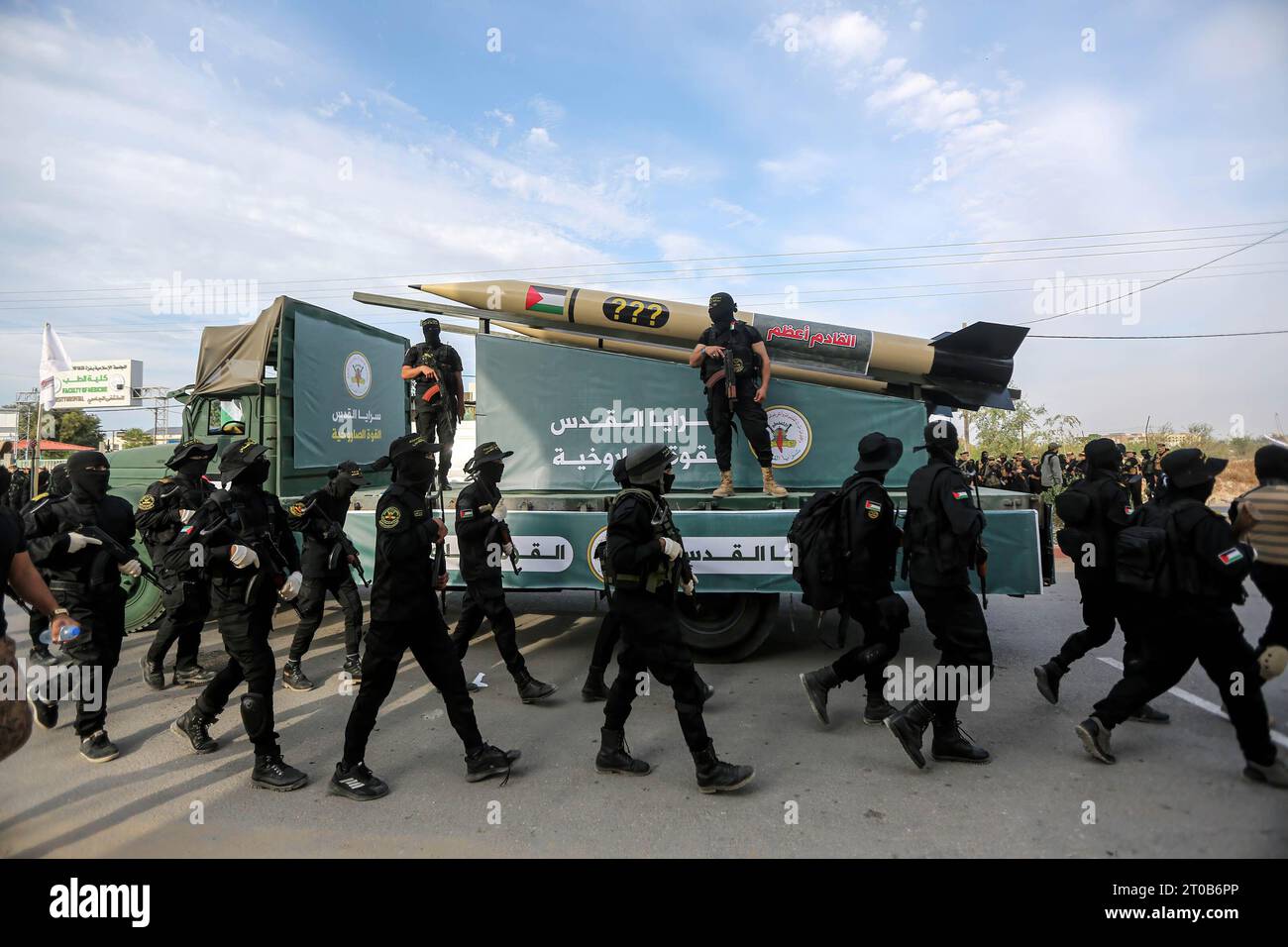 Members of the Al-Quds Brigades, the military wing of the Islamic Jihad movement, participate in an anti-Israel military parade on the occasion of the 36th anniversary of the founding of the movement in Gaza City. Stock Photo