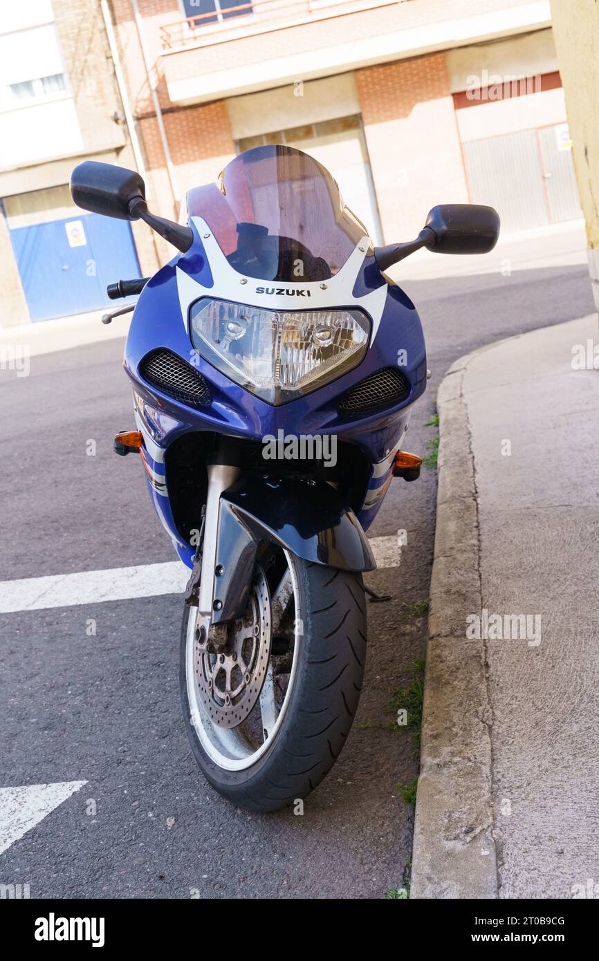 Astorga, Spain - June 4, 2023: Blue Suzuki motorcycle parked in the parking lot. Stock Photo