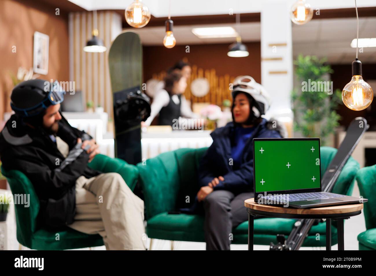 Guests seated in hotel lobby hi-res stock photography and images - Alamy