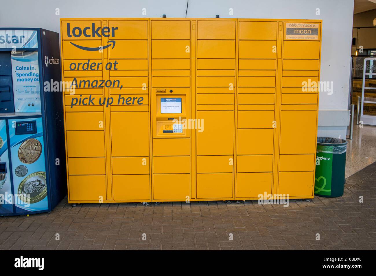 Bristol, England UK - February 14 2023: Amazon yellow online order pick up storage unit.. Stock Photo