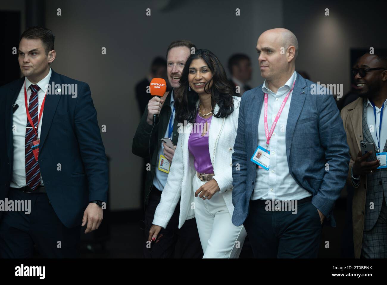 Suella Braverman MP leaving after Rishi Sunak's speech, being pursued by the BBC's Adam Fleming on the final day of the Conservative Party Conference at Manchester Central Convention Complex, Manchester on Wednesday 4th October 2023. (Photo: Pat Scaasi | MI News) Credit: MI News & Sport /Alamy Live News Stock Photo