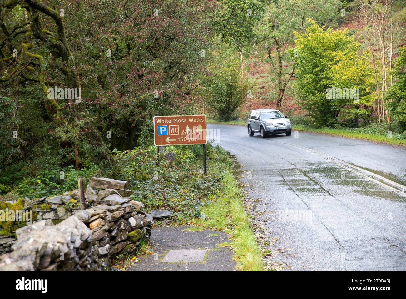 Lake District national park, road between Ambleside and Grasmere with sign for the white moss walks and white moss car park,England,UK Stock Photo