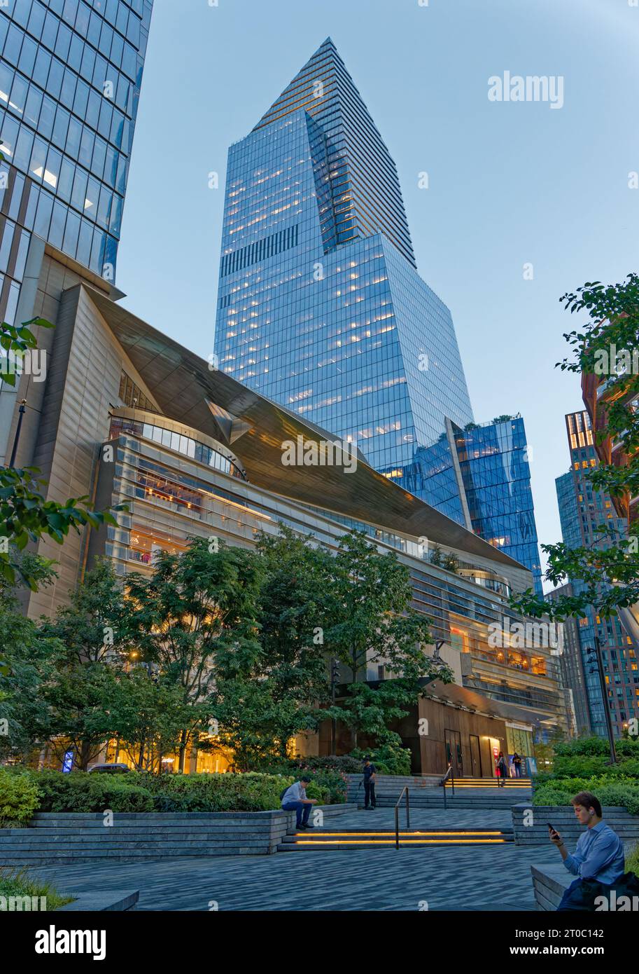 20 Hudson Yards, the shopping and dining hub linking 10 Hudson Yards (rear) with 30 Hudson Yards, is home to high-end retailers and restaurants. Stock Photo