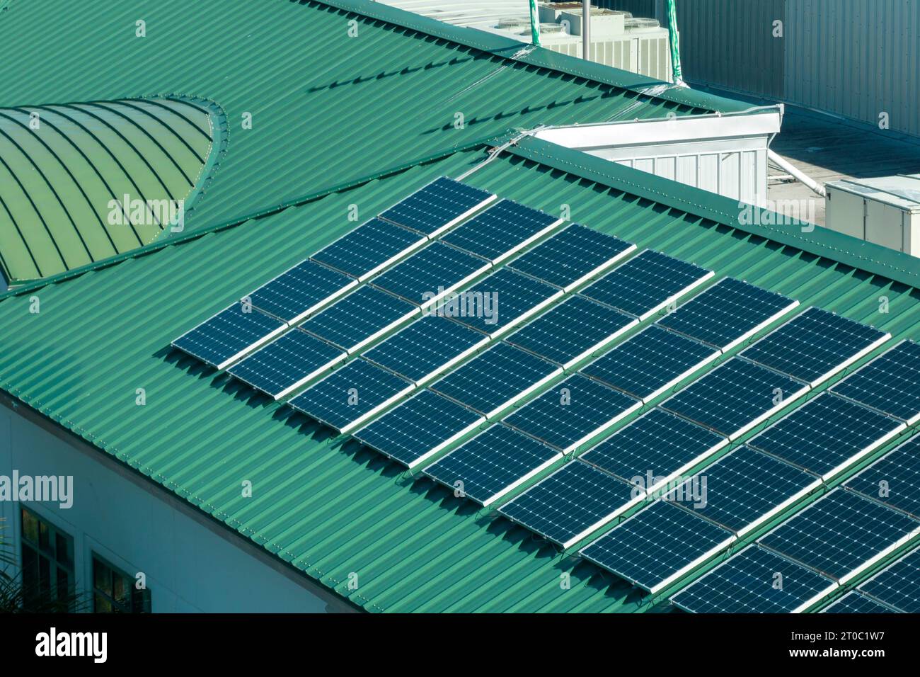 View from above of american condo roof with blue solar photovoltaic