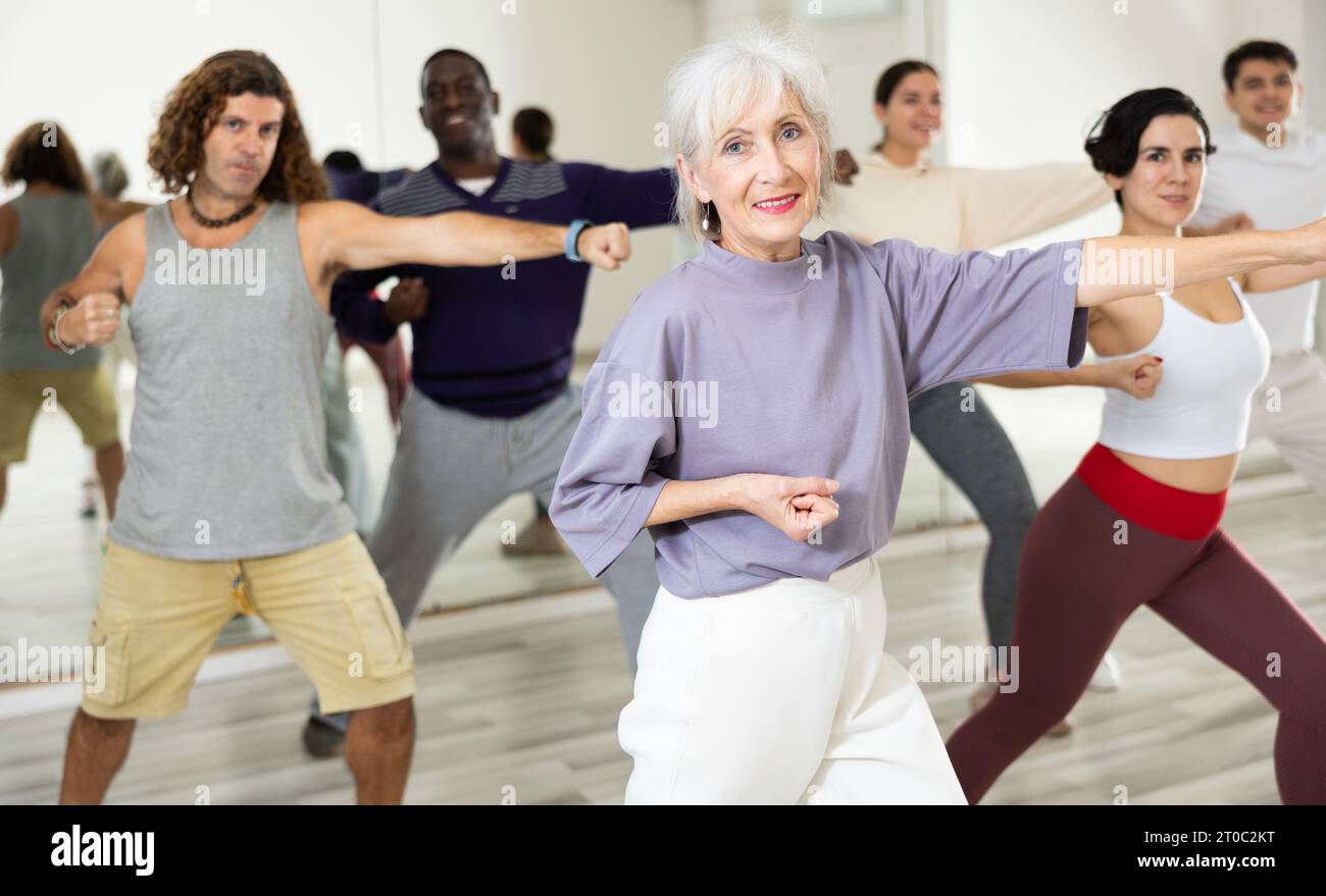 Group of multinational people practicing new modern dance techniques Stock Photo