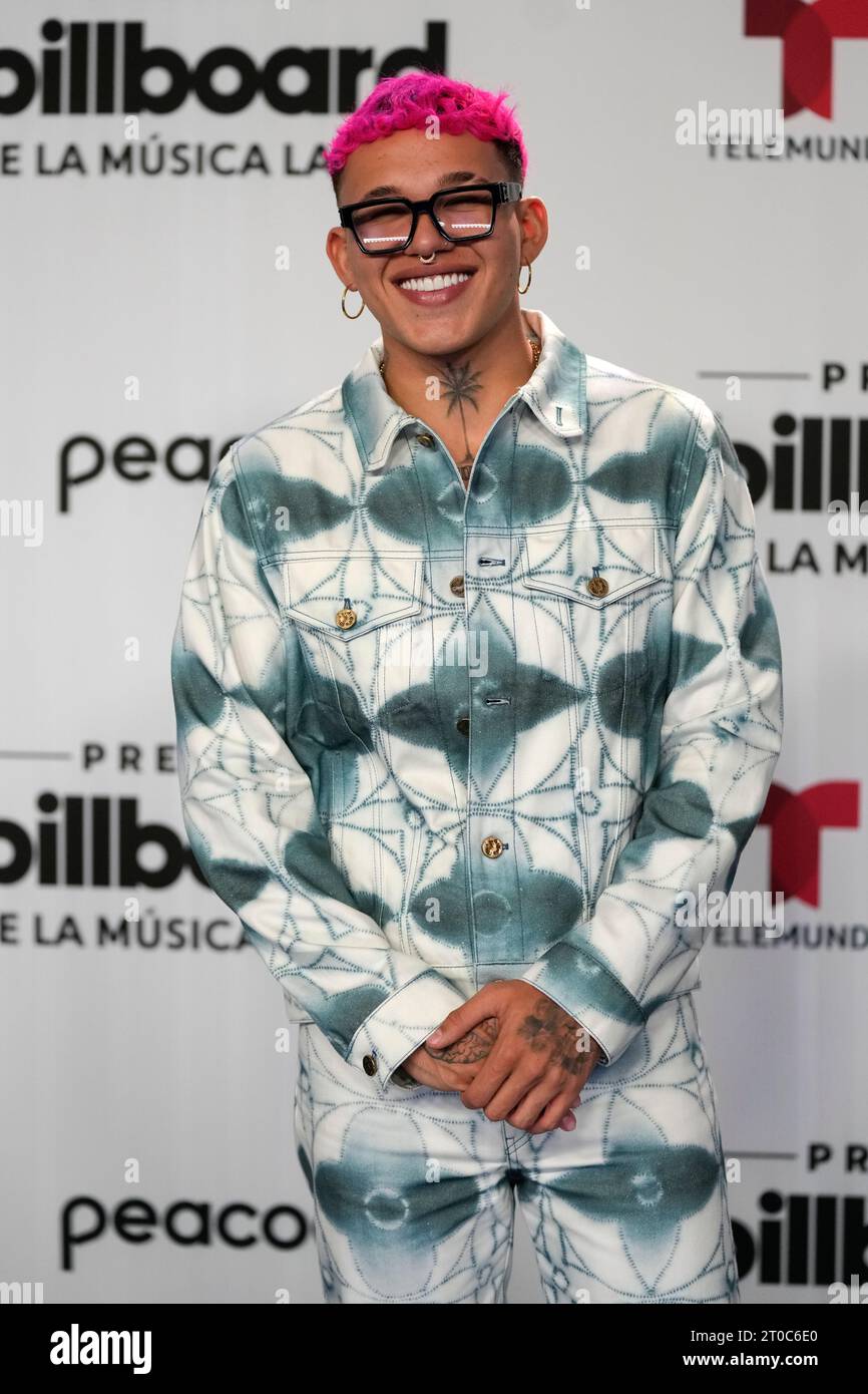 Colombian singer Beele poses for photographers on the blue carpet at