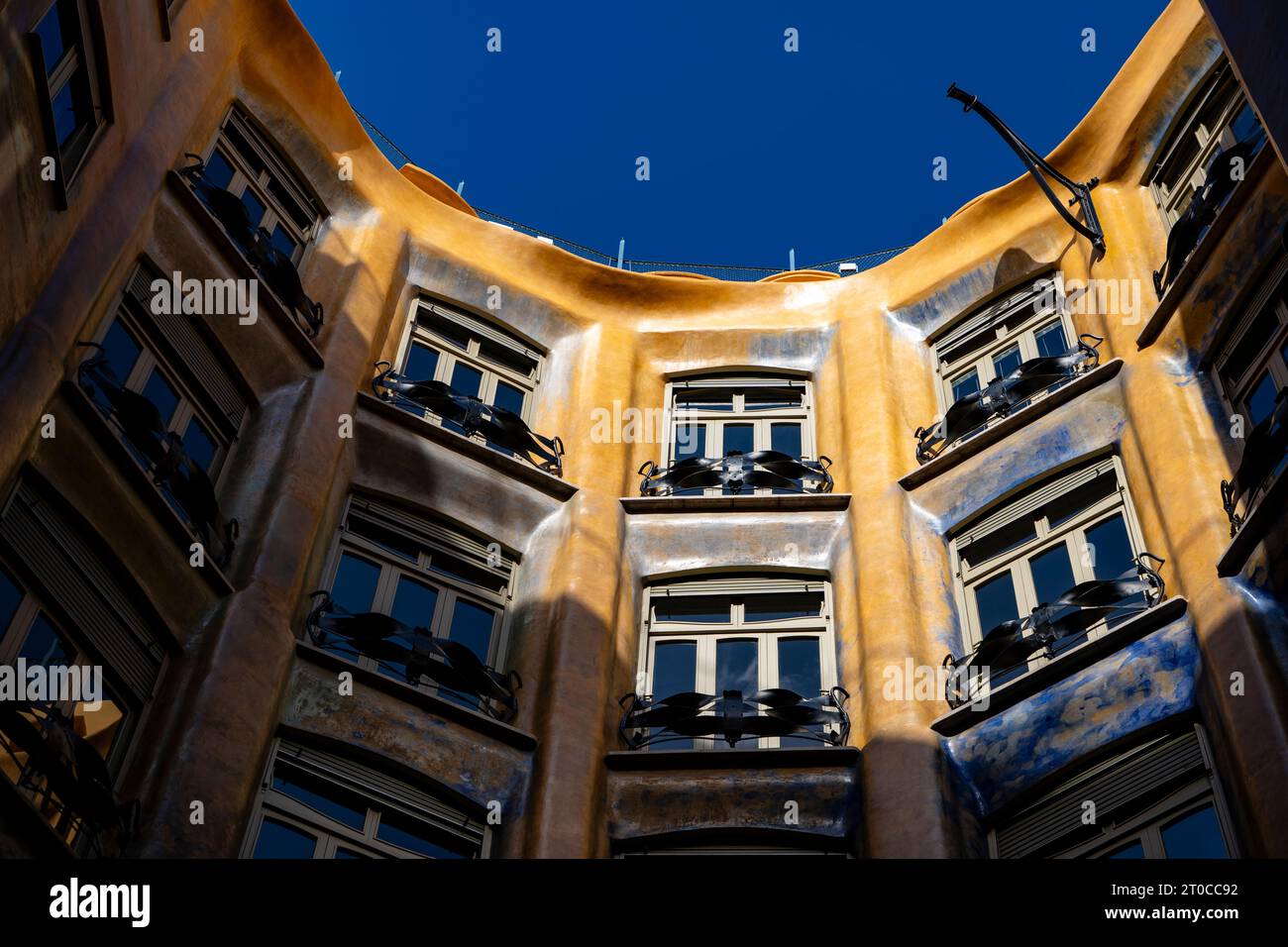 Butterfly courtyard of La Pedrera - Casa Milà, apartment building designed by Catalan architect Antoni Gaudi, on Passeig de Gracia, Barcelona, built b Stock Photo
