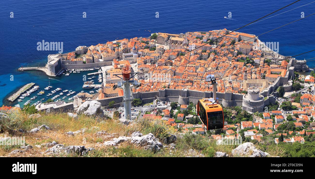 Aerial view of Dubrovnik Old Town on coast of Adriatic Sea with the funicular on the foreground, Croatia, Europe Stock Photo