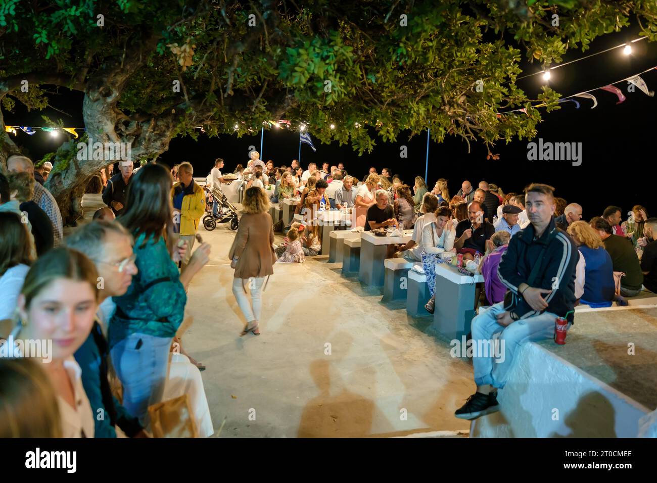 Ios, Greece - September 7, 2023 : 7, 2022 :  A traditional festival in Ios Greece where locals and tourists dancing and celebrating the Holy Mary Stock Photo