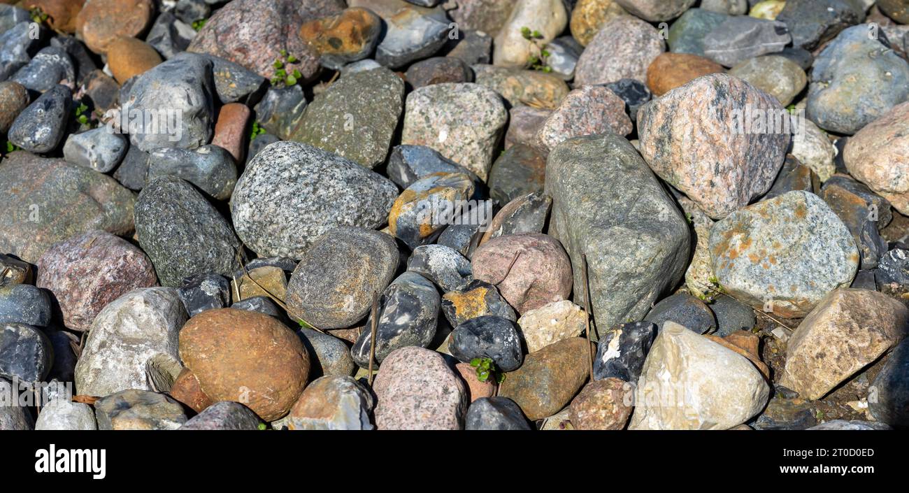 many pebbles stone texture background Stock Photo
