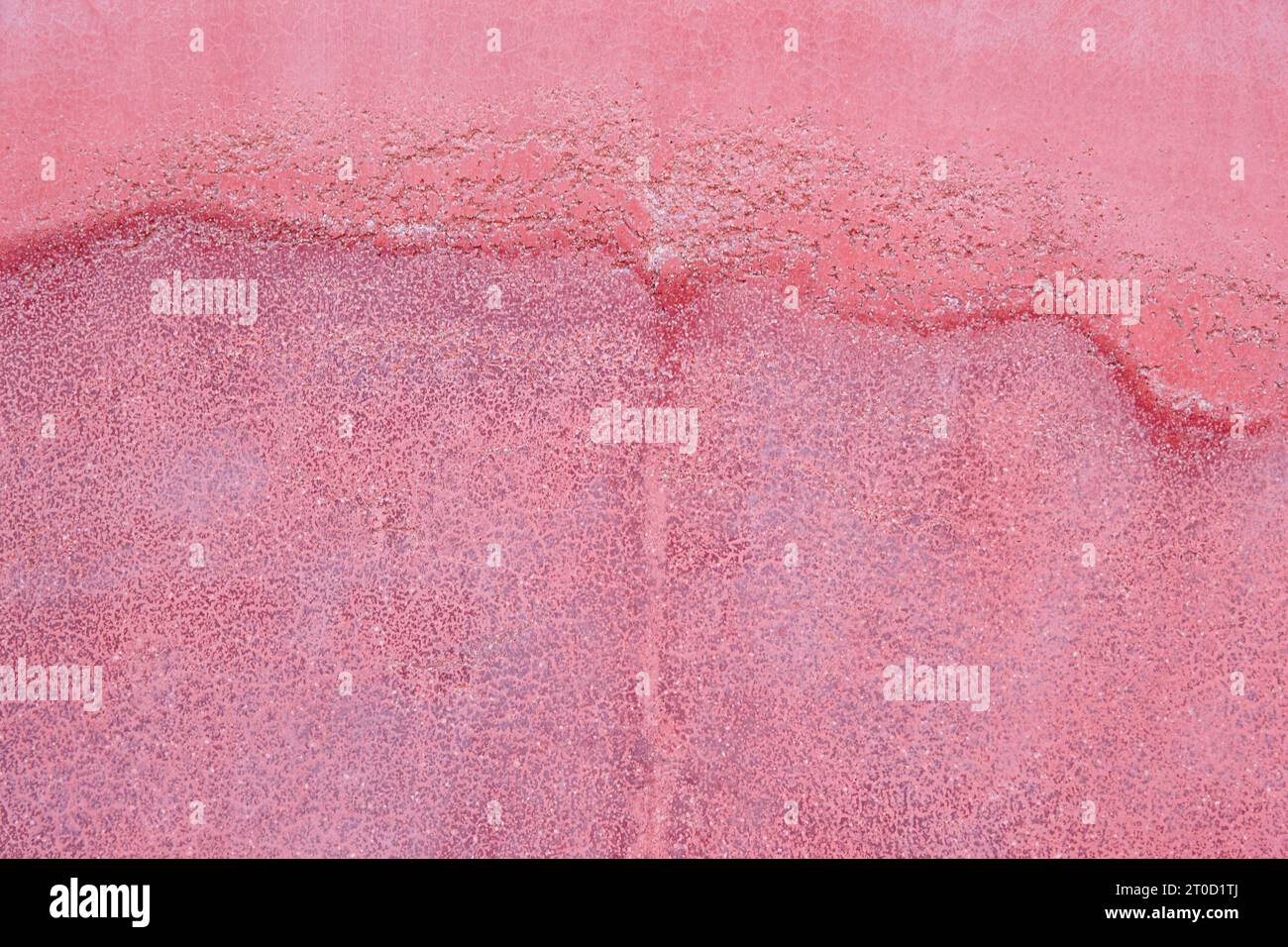 Damp stains on a red wall. Home damage and renovation Stock Photo