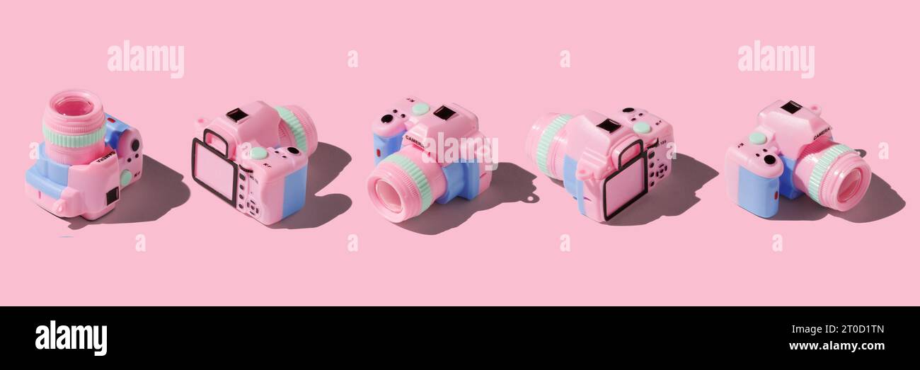 Toy Camera Vector Graphics Colorful toy camera on pastel color background, isometric view Stock ...