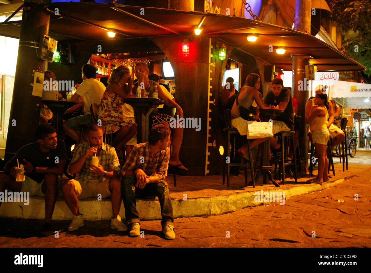 People at a Bar on Rua Das Pedras, Buzios, Rio de Janeiro State, Brazil. Stock Photo