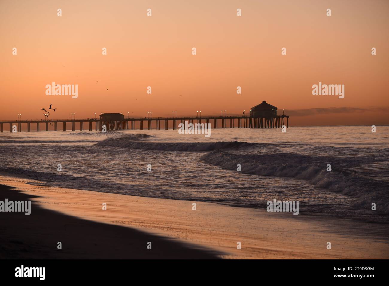 Sunset from the sand in Huntington Beach Ca. Stock Photo