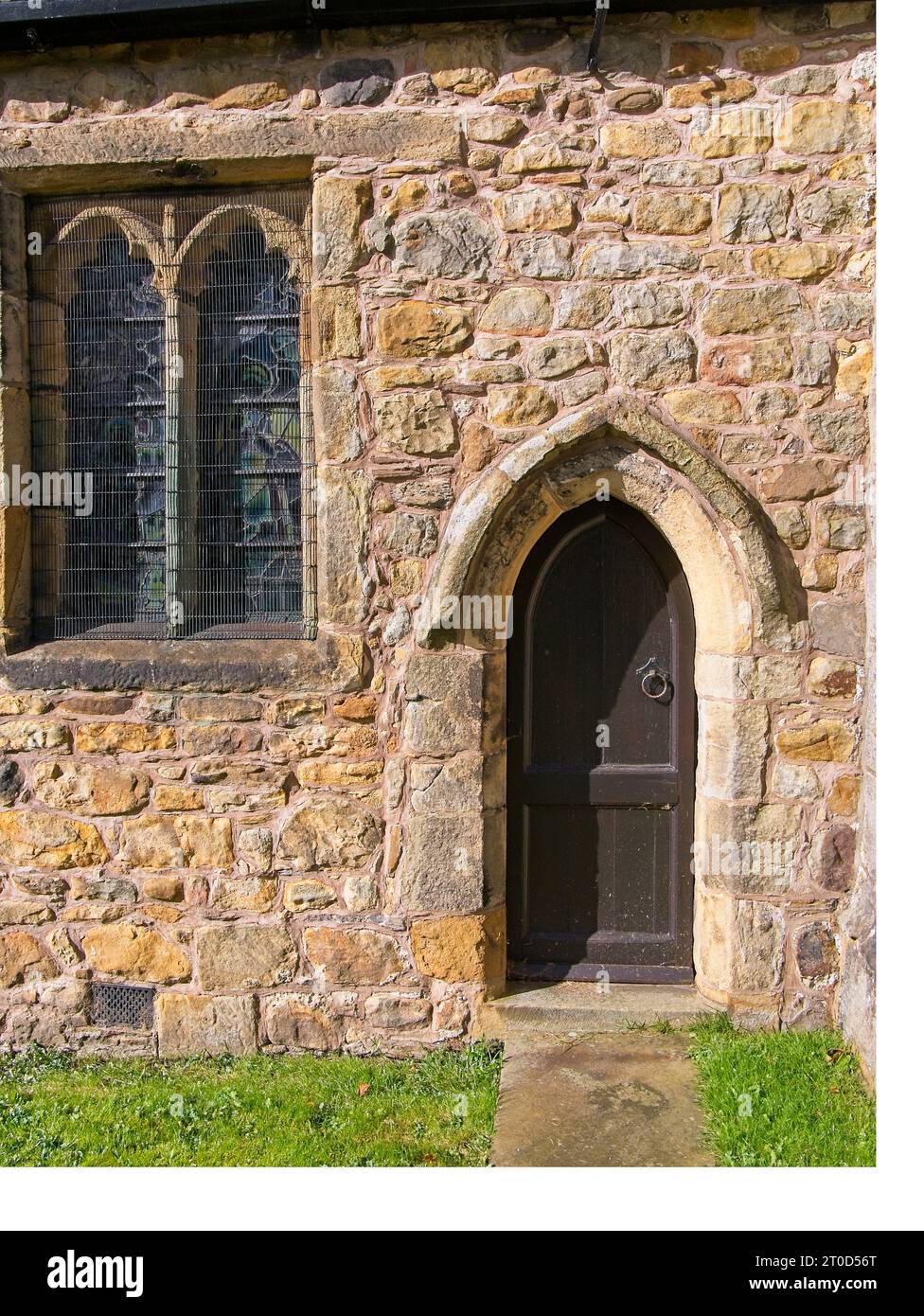 St Peter and St Paul's Anglican Church,  Bolton by Bowland, Ribble Valley, Forest of Bowland, Lancashire. Priests Door in South Wall Stock Photo