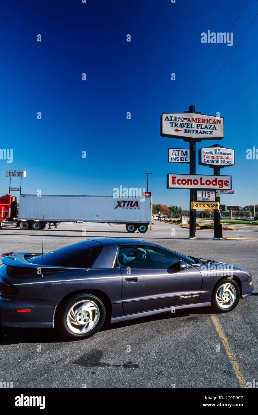 Grey Pontiac Firebird Trans Am 1993 series 3 model parked at truck stop, Florida, USA Stock Photo