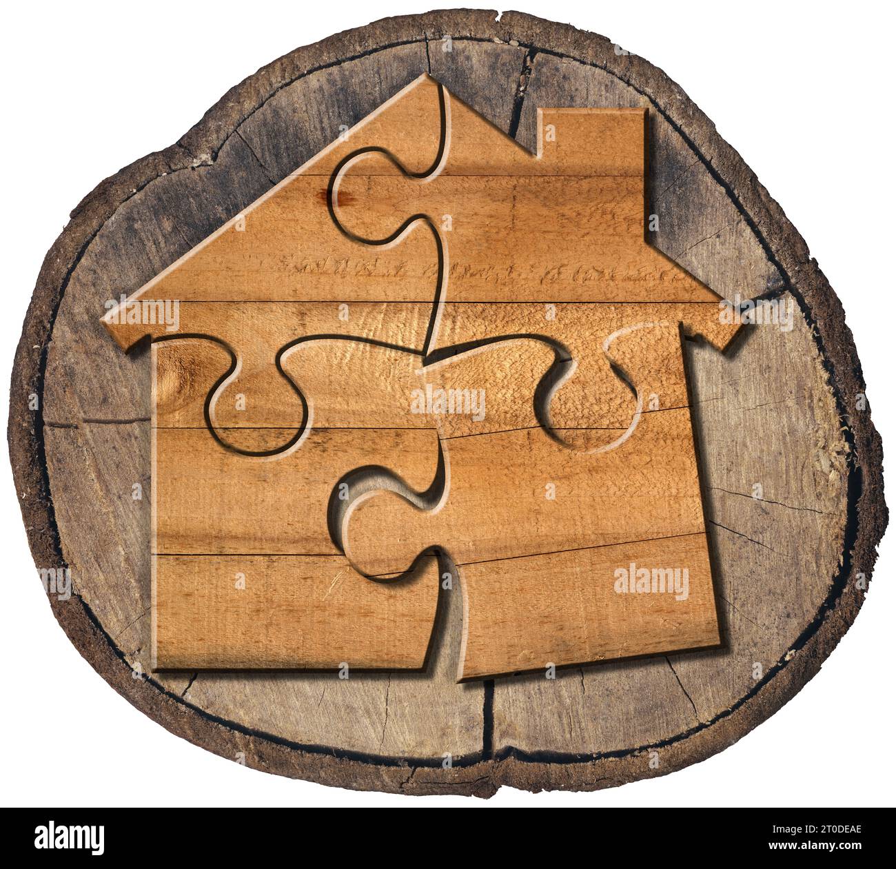 Wooden house made of jigsaw puzzle pieces on a cross section of a tree