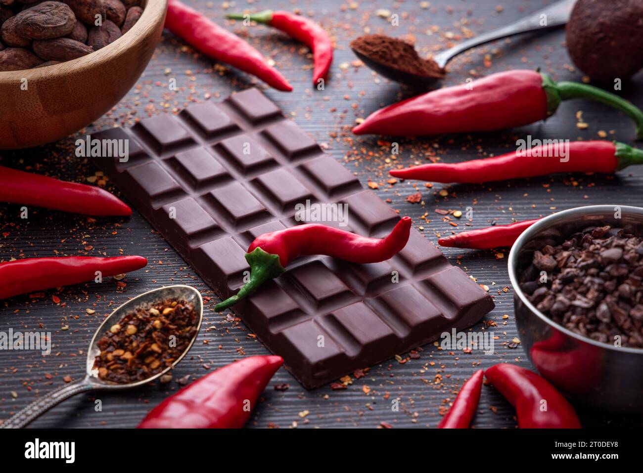 Dark chocolate bar, red hot chilli pepper cayenne, dry hot chili spices