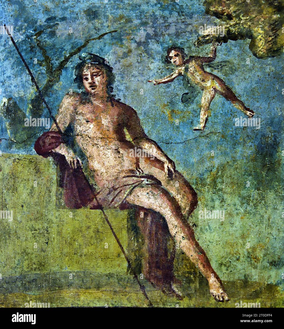 Ganymede 62-79 AD Fresco Pompeii Roman City is located near Naples in the Campania region of Italy. Pompeii was buried under 4-6 m of volcanic ash and pumice in the eruption of Mount Vesuvius in AD 79. Italy ( Young Trojan prince kidnapped by the gods to serve as cupbearer to Zeus, He was the most beautiful among mortals. ) Stock Photo