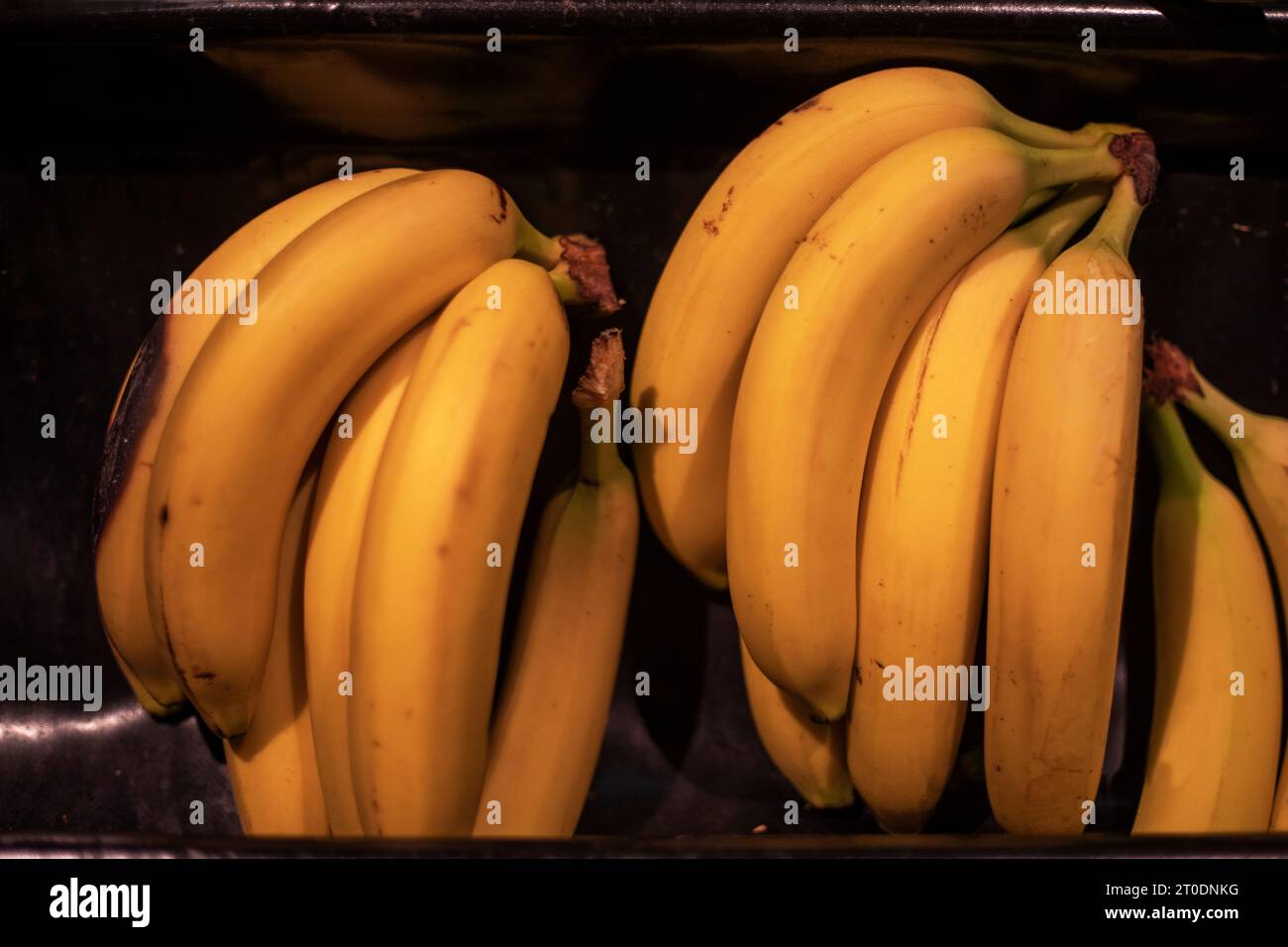 ripe bananas on display in a supermarket Stock Photo Alamy