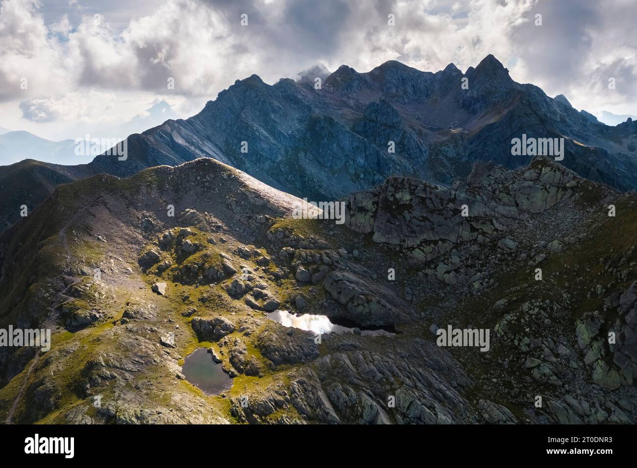 Aerial view of Lago Piazzotti at sunset. Ornica, Val Salmurano, Val Brembana, Alpi Orobie, Bergamo, Bergamo Province, Lombardy, Italy, Europe. Stock Photo