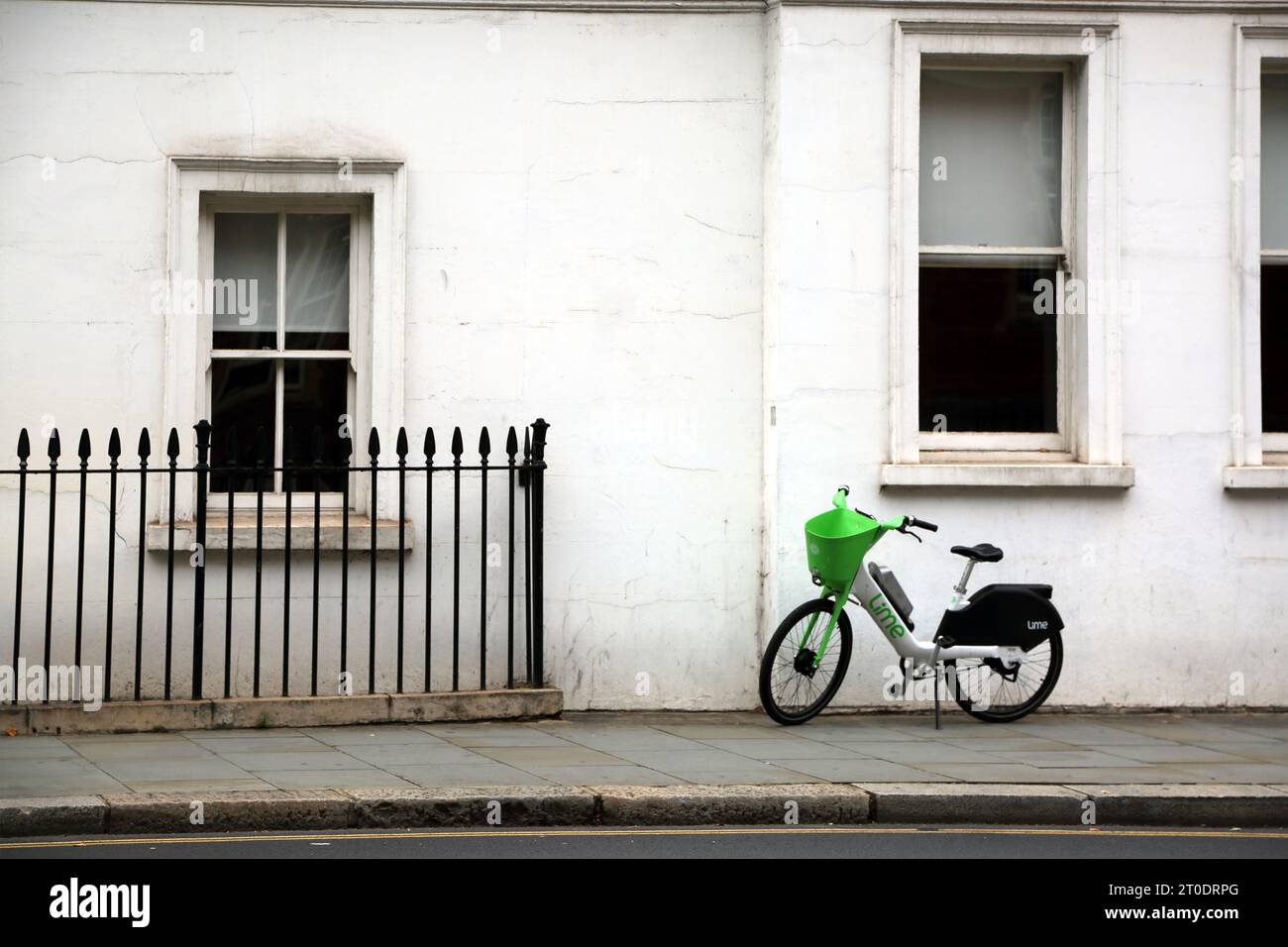 Lime e-Bike Bicycle Sharing System Sydney Street Chelsea London England Stock Photo