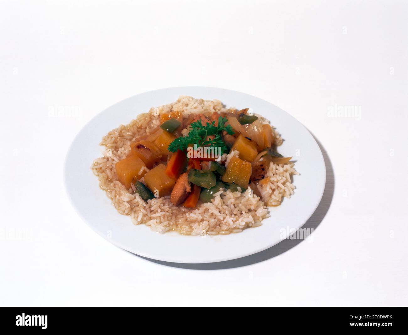 Sweet and Sour Chicken on Rice Stock Photo