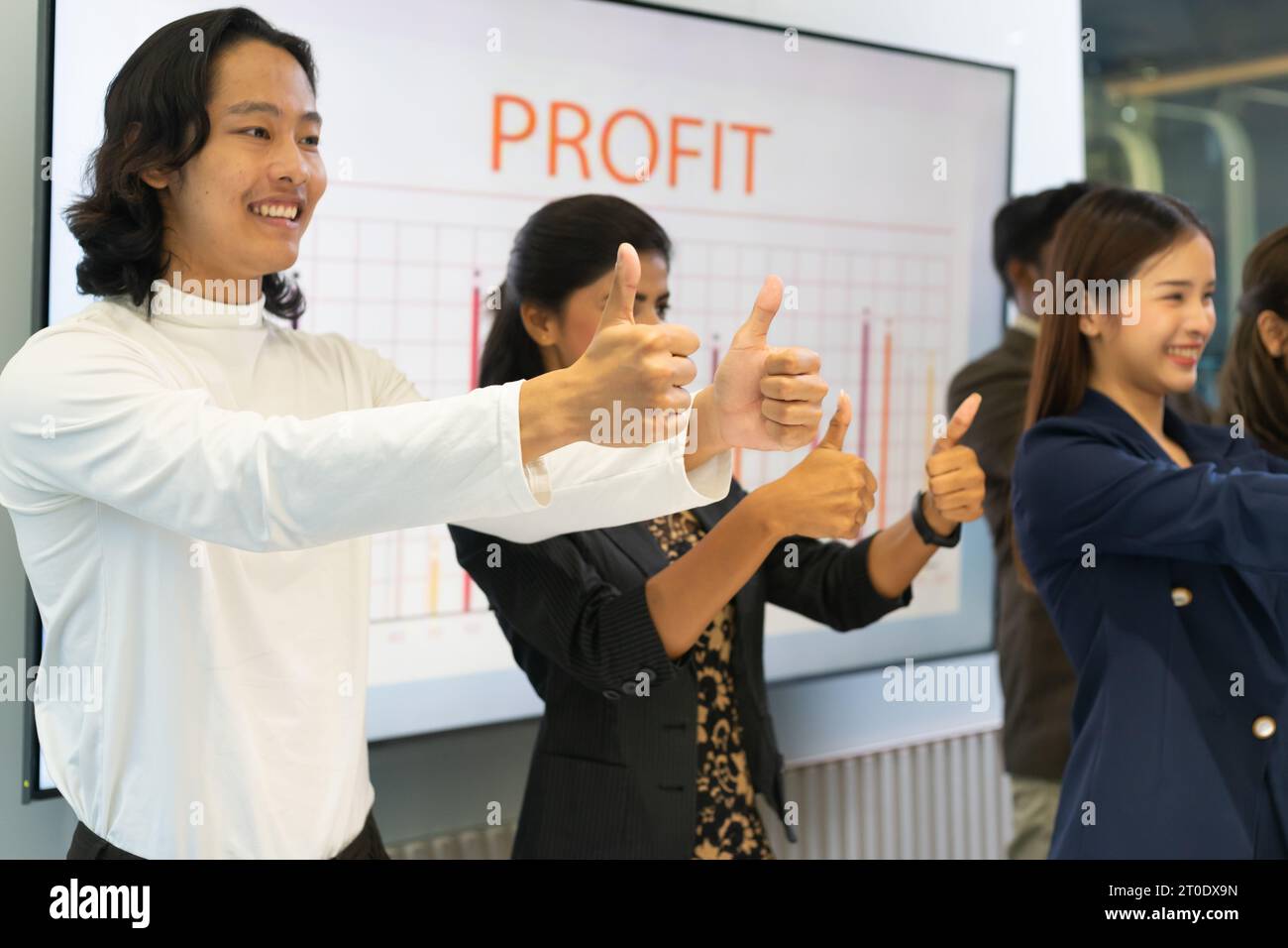 Group of diversity workers showing their confident, thumbs up posture ...