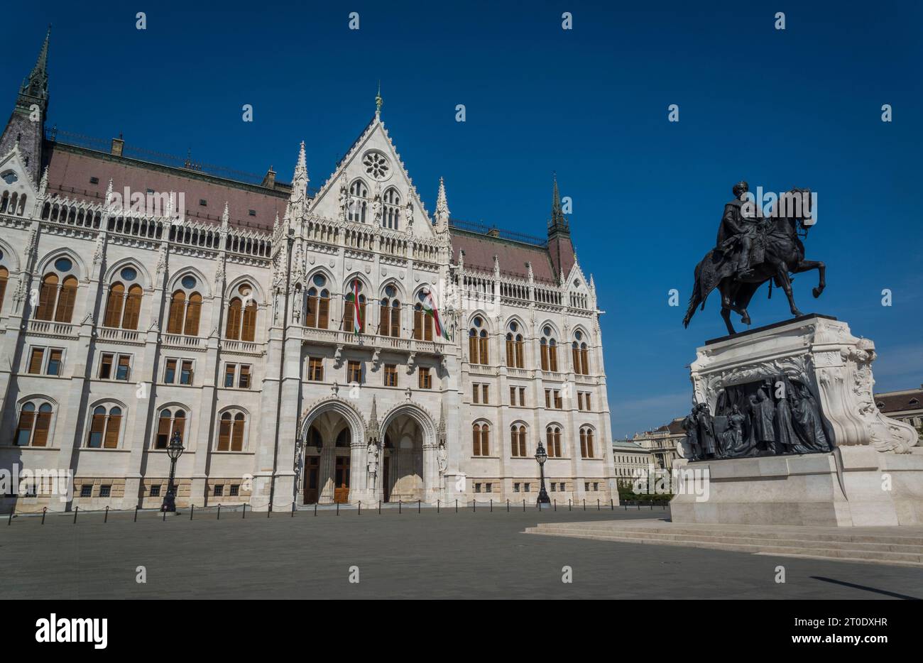 Equestrian statue of Gyula Andrássy in front of Hungarian Parliament, built in Gothic Revival Style, Budapest, Hungary Stock Photo