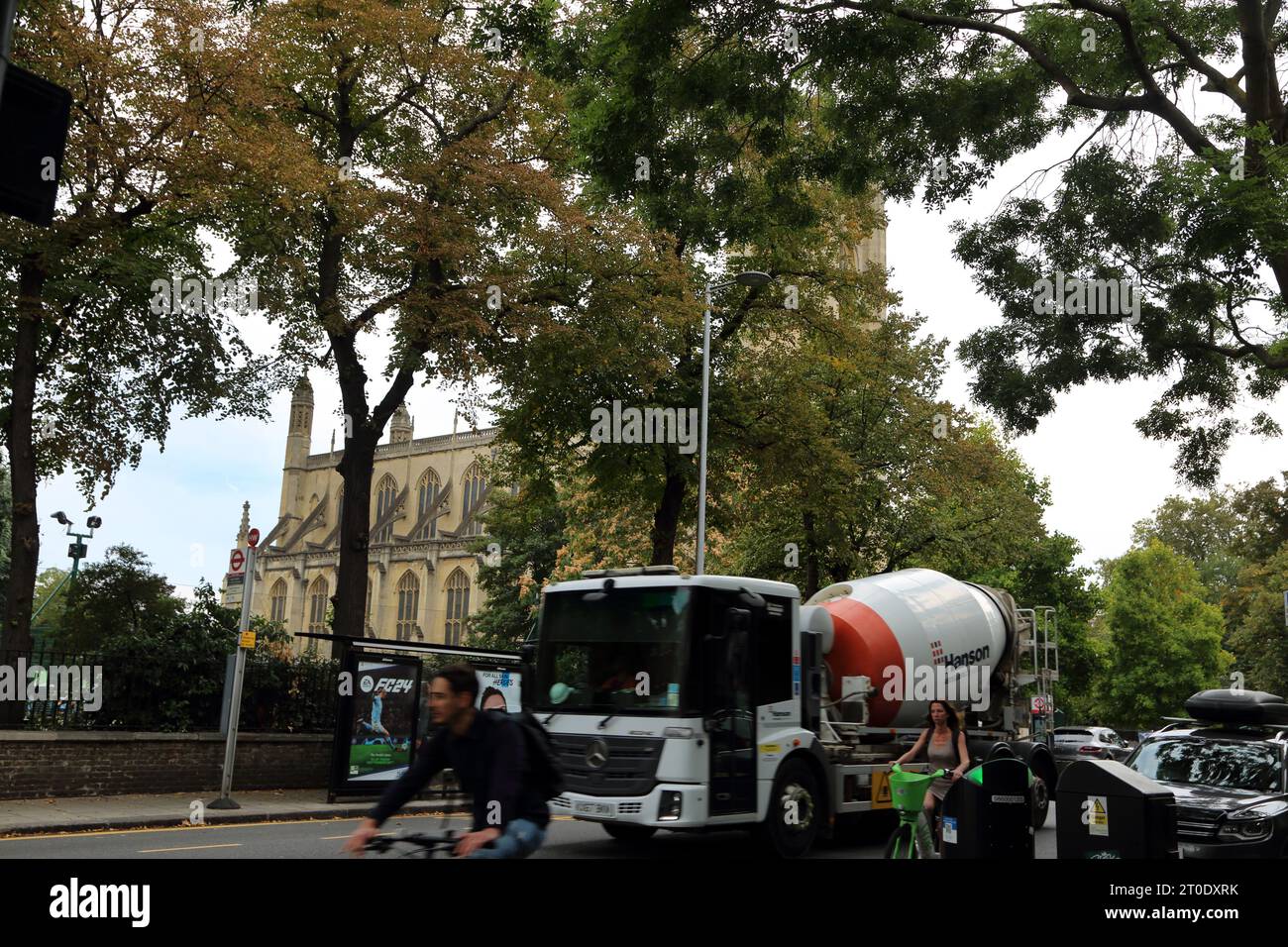 Bus Stop and Cement Mixer Lorry Outside St Luke's Church Sydney Street Chelsea London England Stock Photo