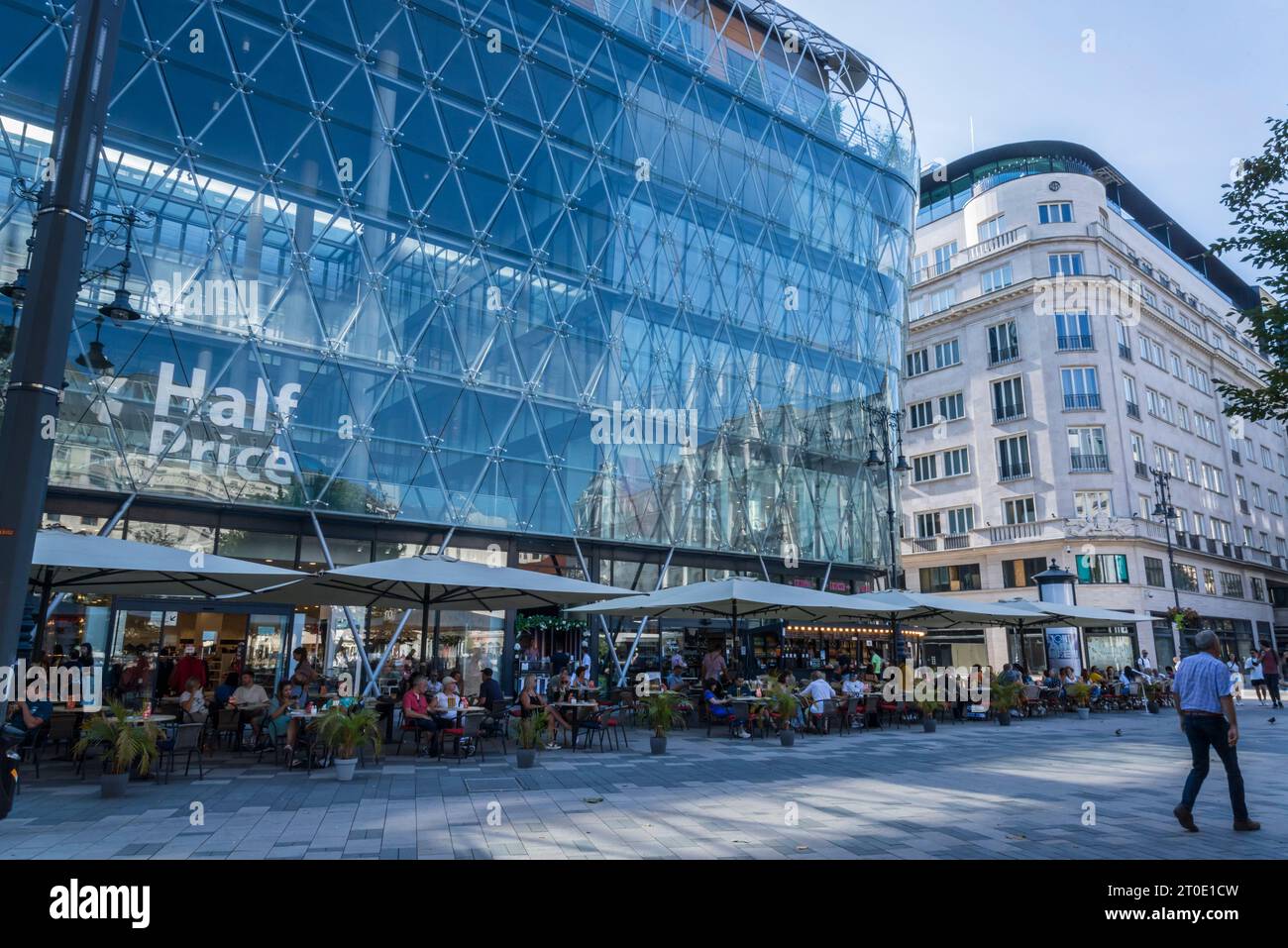 HalfPrice store and outdoor cafes, Vörösmarty Square, Budapest, Hungary Stock Photo