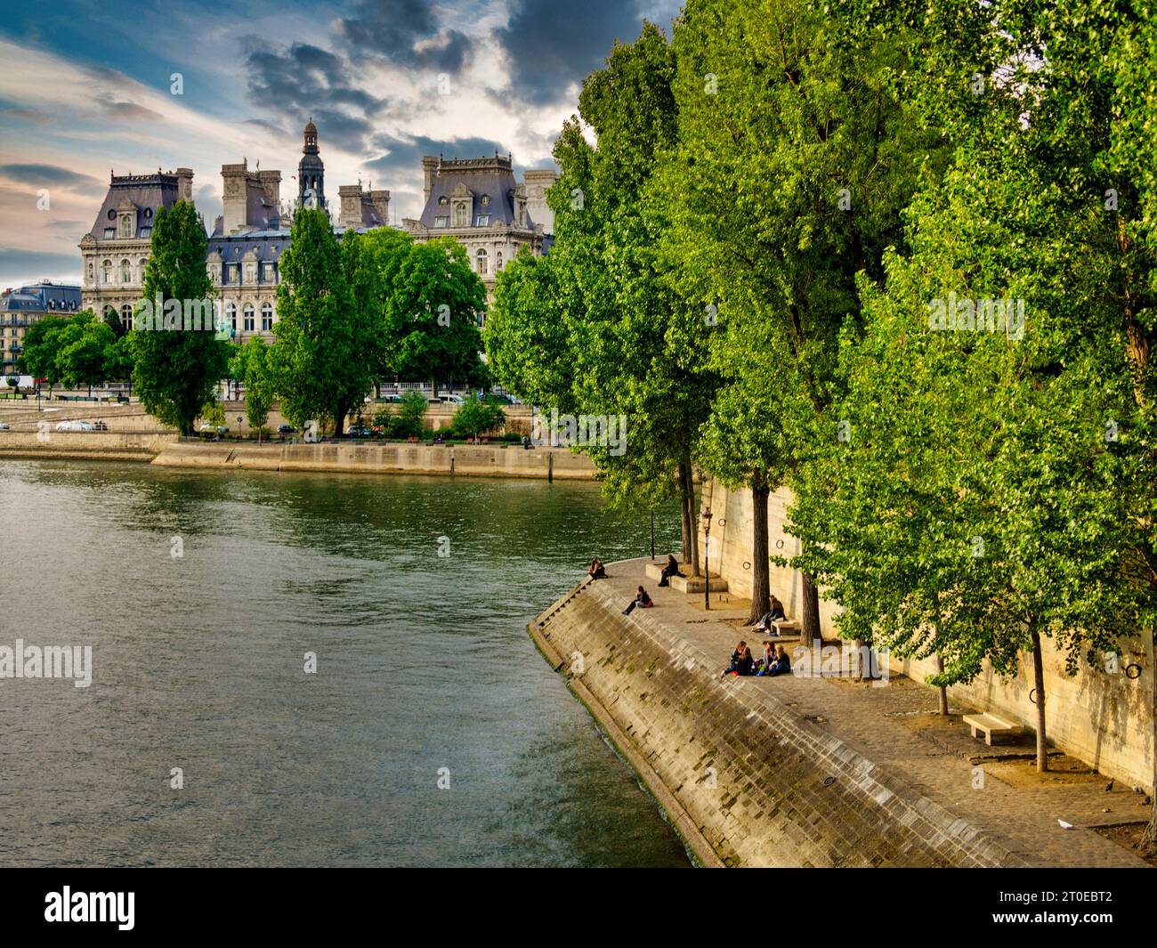 Riverbank and river Seine in front of The Louvre museum. Paris. Ile-de-France. France Stock Photo