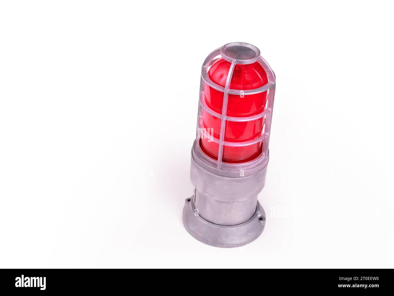 Isolated alarm siren with red glow. Perspective view of an emergency caution warning light or beacon flashing light with metal base. Copy space. Selec Stock Photo
