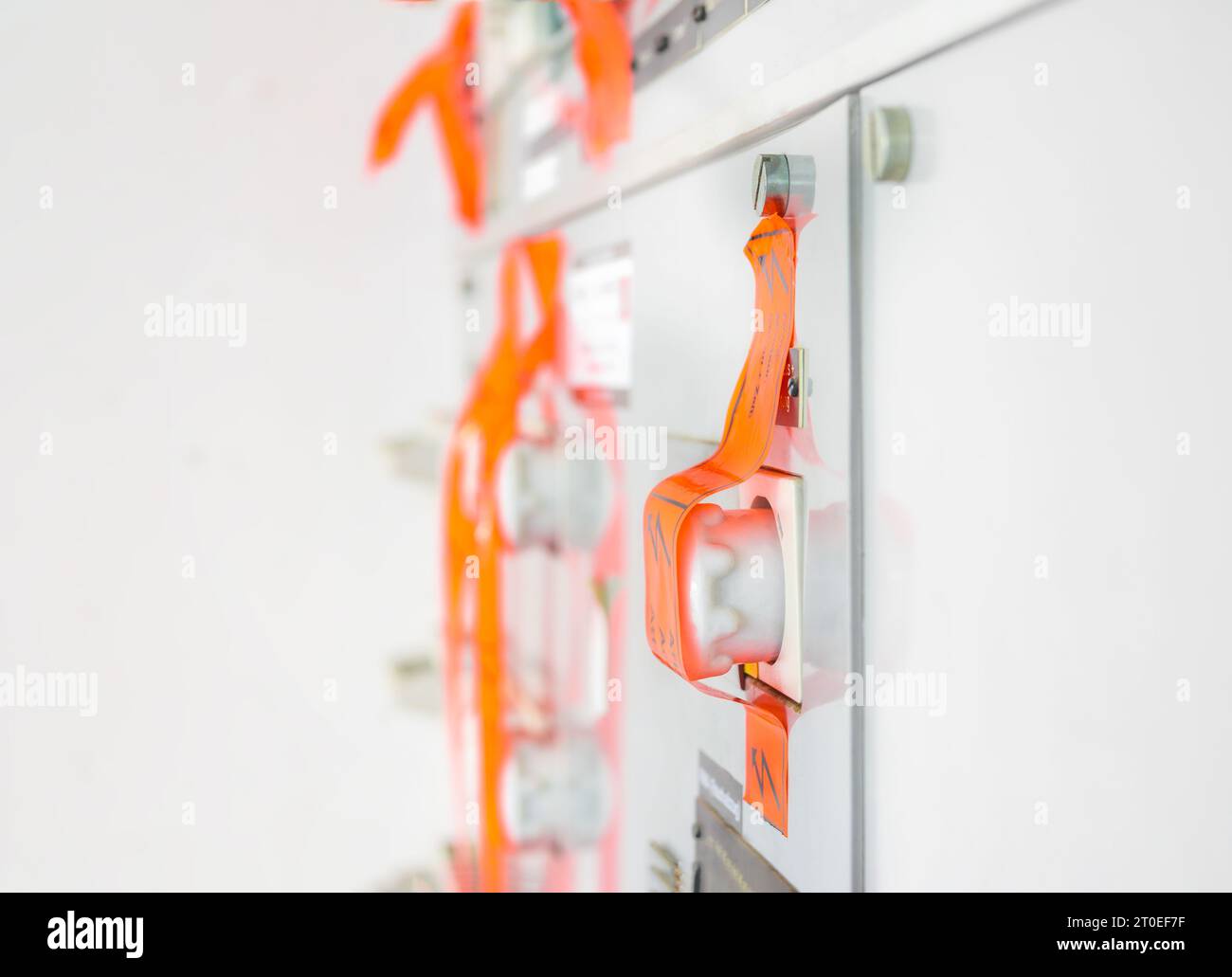 Electrical with tapes over fuses. Orange tape over multiple