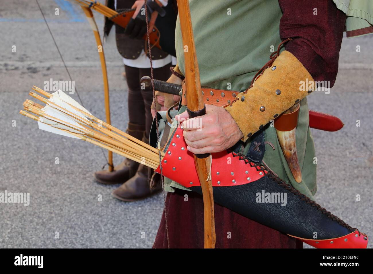 archer hunting with leather arrow holder and medieval clothes during