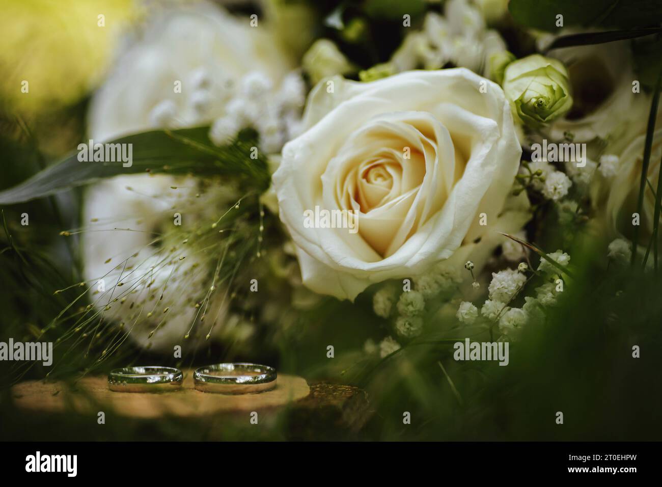 Bridal bouquet and wedding rings Stock Photo