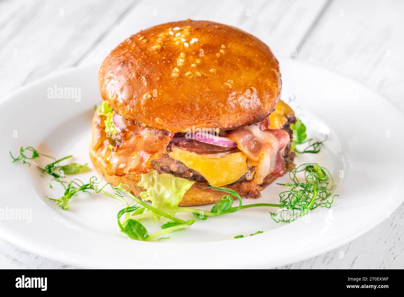 Homemade hamburger with bacon on the plate Stock Photo